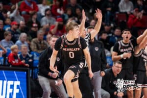 Scottsbluff's Caleb Burda (0) celebrates after three pointer during a Boys State Championship Semifinal Round basketball game Friday, March 13, 2026, in Lincoln, Nebraska. Photo by Jackson D. Luethje.