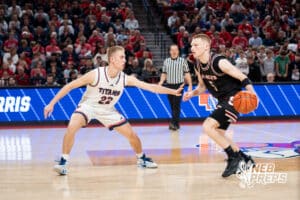 Scottsbluff's Nate Kelley (5) gaurded by Norris's Evan Greenfield (22) during a Boys State Championship Semifinal Round basketball game Friday, March 13, 2026, in Lincoln, Nebraska. Photo by Jackson D. Luethje.