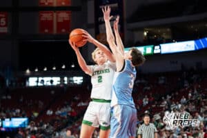 Omaha Skutt's Lucas Heller (2) layup guarded by Elkhorn North's Carter Peterson (3) during a Boys State Championship Semifinal Round basketball game Friday, March 13, 2026, in Lincoln, Nebraska. Photo by Jackson D. Luethje.