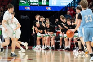 Omaha Skutt’s bench celebrates during a Boys State Championship Semifinal Round basketball game Friday, March 13, 2026, in Lincoln, Nebraska. Photo by Jackson D. Luethje.