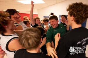 Bergan Catholic celebrates its win with an assistant coach during a boys' state semifinal basketball game, Mar. 13, 2026, in Lincoln, Nebraska. Photo by Braden Cochran.