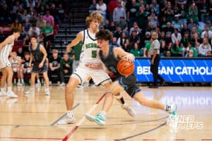 Freeman's Easton Buss (0) gaurded by Fremont Bergan's Gavin Dean (5) during a Boys State Championship Semifinal Round basketball game Friday, March 13, 2026, in Lincoln, Nebraska. Photo by Jackson D. Luethje.