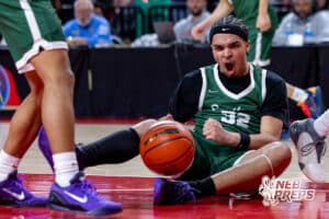 Lincoln Southwest’s Kobi Kerr (32) is celebrating after getting possession of the basketball for the Silver Hawks during a high school basketball game against Westside in the semifinals of the NSAA boys state basketball tournament on March 11, 2026 in Lincoln, Nebraska. Photo By Jack Stephens.
