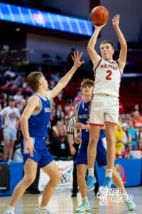 EPPJ guard Michael Selting (2) takes a mid range jumper with defenders surrounding him during a boys state semifinal basketball game, Mar. 13, 2026, Lincoln, Nebraska. Photo by Braden Cochran.