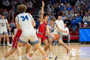Norfolk Lutheran's Gavin Feddern (14) guarded by Mead’s Mason Reed (3) during a Boys State Championship First Round basketball game Thursday, March 12, 2026, in Lincoln, Nebraska. Photo by Jackson D. Luethje.
