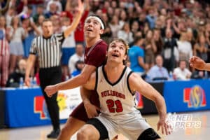 Auburn's's Blake Swanson (30) boxed out by Auburn's's Creighton Keeling (23) during a Boys State Championship First Round basketball game Thursday, March 12, 2026, in Lincoln, Nebraska. Photo by Jackson D. Luethje.