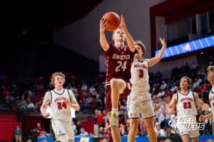 Gothenburg's Bryson Neels (24) layup during a Boys State Championship First Round basketball game Thursday, March 12, 2026, in Lincoln, Nebraska. Photo by Jackson D. Luethje.