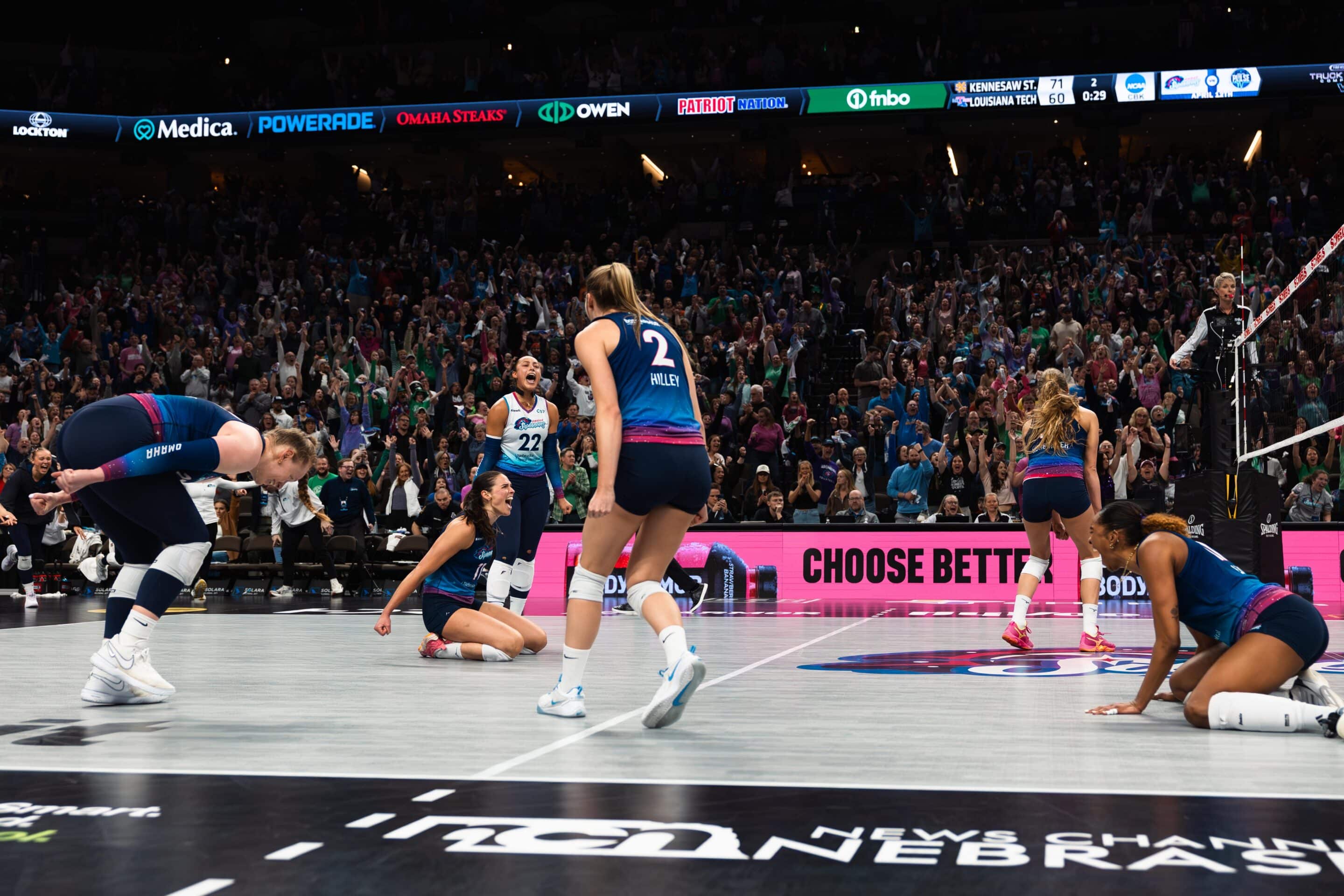 The Supernovas celebrate match point following a block by Sydney Hilley (2).