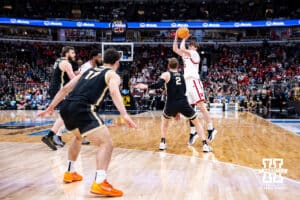 Nebraska Cornhusker forward Braden Frager (5) makes a three-point basket against the Purdue Boilermakers during the Big Ten Men’s Basketball Championships quarter-final on Friday, March 13, 2026, in Chicago, Illinois. Photo by John S. Peterson.