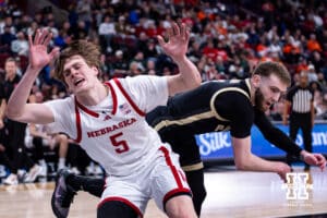 Nebraska Cornhusker forward Braden Frager (5) gets fouled by Purdue Boilermaker guard Braden Smith (3) during the Big Ten Men’s Basketball Championships quarter-final on Friday, March 13, 2026, in Chicago, Illinois. Photo by John S. Peterson.