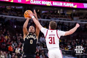 Nebraska Cornhusker guard Cale Jacobsen (31) blocks a shot by Purdue Boilermaker guard C.J. Cox (0) during the Big Ten Men’s Basketball Championships quarter-final on Friday, March 13, 2026, in Chicago, Illinois. Photo by John S. Peterson.