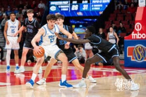 Creighton Prep's Max Jungers (12) guarded by Papillion-La Vista South's Grant Beckenhauer (23) during a Boys State Championship First Round basketball game Wednesday, March 11, 2026, in Lincoln, Nebraska. Photo by Jackson D. Luethje.