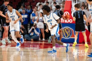 Creighton Prep's Torran Carter-brown (3) celebrates after three pointer during a Boys State Championship First Round basketball game Wednesday, March 11, 2026, in Lincoln, Nebraska. Photo by Jackson D. Luethje.