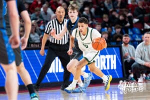 Lincoln Southwest's Dakari Wilson (30) dribbles up the court during a Boys State Championship First Round basketball game Wednesday, March 11, 2026, in Lincoln, Nebraska. Photo by Jackson D. Luethje.