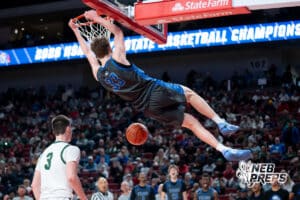 Millard North's Jack Chambers (33) dunks during a Boys State Championship First Round basketball game Wednesday, March 11, 2026, in Lincoln, Nebraska. Photo by Jackson D. Luethje.