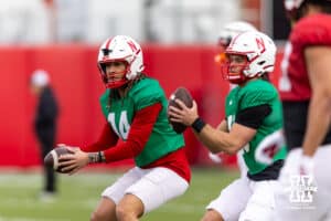 Nebraska Cornhusker quarterbacks TJ Lateef (14) and Anthony Colandrea (10) run a side by side passing drill during spring football practice on Tuesday, March 10, 2026, in Lincoln, Nebraska. Photo by John S. Peterson.