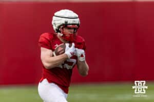 Nebraska Cornhusker running back Izaac Dickey (45) runs with the ball during spring football practice on Tuesday, March 10, 2026, in Lincoln, Nebraska. Photo by John S. Peterson.
