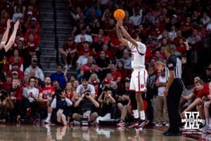 Nebraska Cornhusker guard Jamarques Lawrence (10) makes a three-point shot against the Iowa Hawkeyes in the second half during a college basketball game on Sunday, March 8, 2026, in Lincoln, Nebraska. Photo by John S. Peterson.