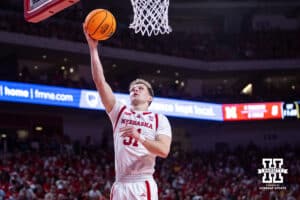 Nebraska Cornhusker guard Cale Jacobsen (31) makes a lay against the Iowa Hawkeyes during a college basketball game on Sunday, March 8, 2026, in Lincoln, Nebraska. Photo by John S. Peterson.
