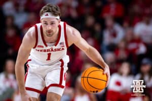 Nebraska Cornhusker guard Sam Hoiberg (1) dribbles the ball down the court against the Iowa Hawkeyes in the first half during a college basketball game on Sunday, March 8, 2026, in Lincoln, Nebraska. Photo by John S. Peterson.