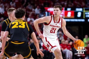 Nebraska Cornhusker forward Pryce Sandfort (21) dribbles the ball against the Iowa Hawkeyes in the first half during a college basketball game on Sunday, March 8, 2026, in Lincoln, Nebraska. Photo by John S. Peterson.