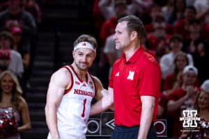 Nebraska Cornhusker senior Sam Hoiberg (1) stands with his father on Senior Day during a college basketball game on Sunday, March 8, 2026, in Lincoln, Nebraska. Photo by John S. Peterson.