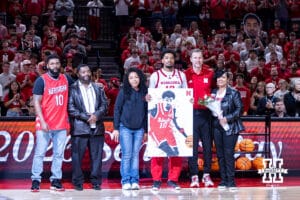 Nebraska Cornhusker senior Jamarques Lawrence (10) poses for a photo with Fred Hoibeg and family with coach Fred Hoiberg on Senior Day before taking on the Iowa Hawkeyes during a college basketball game on Sunday, March 8, 2026, in Lincoln, Nebraska. Photo by John S. Peterson.