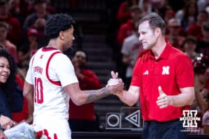 Nebraska Cornhusker senior Jamarques Lawrence (10) shakes hands with coach Fred Hoiberg on Senior Day before taking on the Iowa Hawkeyes during a college basketball game on Sunday, March 8, 2026, in Lincoln, Nebraska. Photo by John S. Peterson.