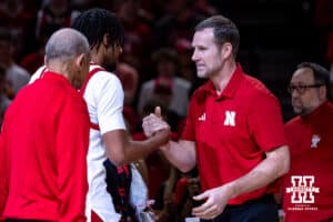 Nebraska Cornhusker senior Kendall Blue (2) shakes hands with coach Fred Hoiberg on Senior Day before taking on the Iowa Hawkeyes during a college basketball game on Sunday, March 8, 2026, in Lincoln, Nebraska. Photo by John S. Peterson.