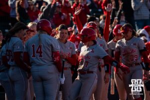 Nebraska Cornhusker Ava Kuszak celebrates with her team during a softball game at Bowlin Field on March 7th, 2026, in Lincoln, Nebraska. Photo by Collin Stilen.
