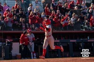 Nebraska Cornhusker Ava Kuszak celebrates on her way to home plate during a softball game at Bowlin Field on March 7th, 2026, in Lincoln, Nebraska. Photo by Collin Stilen.