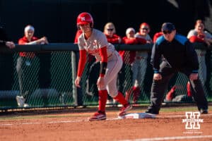 Nebraska Cornhusker Lauren Camenzind awaits home plate during a softball game at Bowlin Field on March 7th, 2026, in Lincoln, Nebraska. Photo by Collin Stilen.