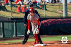 Nebraska Cornhusker Jesse Farrell is locked at third base awaiting home plate during a softball game at Bowlin Field on March 7th, 2026, in Lincoln, Nebraska. Photo by Collin Stilen.