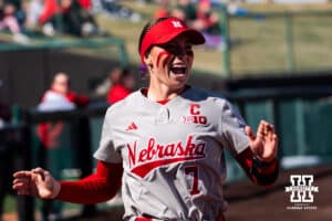 Nebraska Cornhusker Ava Kuszak is all smiles pregame during a softball game at Bowlin Field on March 7th, 2026, in Lincoln, Nebraska. Photo by Collin Stilen.