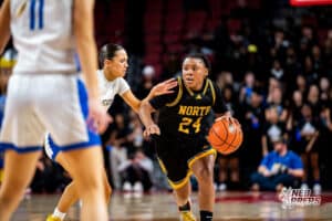 Omaha North's Himayajo Metoyer (24) dribbles during a Girls State Championship Semifinal Round basketball game Friday, March 6, 2026, in Lincoln, Nebraska. Photo by Jackson D. Luethje.