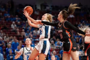 Fort Calhoun's Emily Warfield (12) layup during a Girls State Championship Semifinal Round basketball game Friday, March 6, 2026, in Lincoln, Nebraska. Photo by Jackson D. Luethje.
