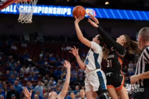 Malcolm's Halle Dolliver (30) layup during a Girls State Championship Semifinal Round basketball game Friday, March 6, 2026, in Lincoln, Nebraska. Photo by Jackson D. Luethje.