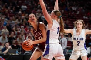 Gothenburg's Aubry Hall (22) guarded by Milford's Kylie Jakub (1) during a Girls State Champiohsip Semifinal Round basketball game Friday, March 6, 2026, in Lincoln, Nebraska. Photo by Jackson D. Luethje.
