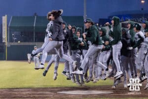 Michigan State Spartans celebrate the three-run homer by Issac Sturgess in the ninth inning to tie up the score against the Nebraska Cornhuskers during a college baseball game on Friday, March 6, 2026, in Lincoln, Nebraska. Photo by John S. Peterson.