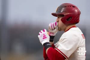 Nebraska Cornhusker infielder Josh Overbeek (4) tries to warm up his hands before batting against the Michigan State Spartans in the seventh inning during a college baseball game on Friday, March 6, 2026, in Lincoln, Nebraska. Photo by John S. Peterson.