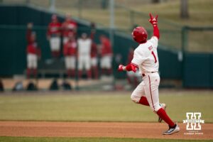Nebraska Cornhusker Jett Buck (1) waves to the bullpen after hitting a home run against the Michigan State Spartans in the sixth inning during a college baseball game on Friday, March 6, 2026, in Lincoln, Nebraska. Photo by John S. Peterson.
