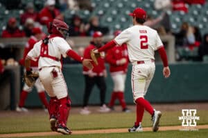 Nebraska Cornhusker catcher Jeter Worthley (0) gives pitcher Ty Horn (2) five after the top of the fifth inning during a college baseball game on Friday, March 6, 2026, in Lincoln, Nebraska. Photo by John S. Peterson.