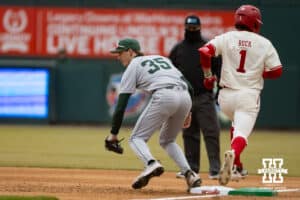 Nebraska Cornhusker Jett Buck (1) beats the out at first base against Michigan State Spartan infielder Randy Seymour (35) during a college baseball game on Friday, March 6, 2026, in Lincoln, Nebraska. Photo by John S. Peterson.