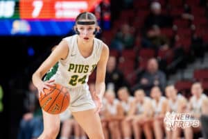 Lincoln Pius X's Austen Davis (24) dribbles during a Girls State Championship First Round basketball game Wednesday, March 4, 2026, in Lincoln, Nebraska. Photo by Jackson D. Luethje.