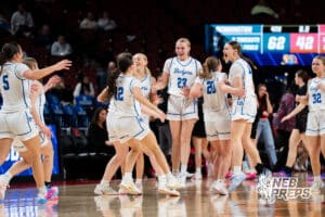 Bennington celebrates during a Girls State Championship First Round basketball game Wednesday, March 4, 2026, in Lincoln, Nebraska. Photo by Jackson D. Luethje.