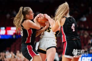 Sidney's Lilee Wieser (33) and Gretna East's Madi Shelburne (35) fight for a jumpball during a Girls State Championship First Round basketball game Wednesday, March 4, 2026, in Lincoln, Nebraska. Photo by Jackson D. Luethje.