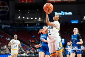 Omaha North's Akazja Foster (2) layup during a Girls State Championship First Round basketball game Wednesday, March 4, 2026, in Lincoln, Nebraska. Photo by Jackson D. Luethje.