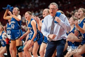 Humphrey Archangels head coach Bryan Reichmuth celebrates during a Girls State Championship First Round basketball game Wednesday, March 4, 2026, in Lincoln, Nebraska. Photo by Jackson D. Luethje.