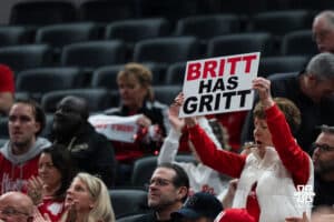 Nebraska Cornhusker fan holds a sign during a college basketball game against Indiana on Mar 4th, 2026, in Indianapolis, Indiana. Photo by Brandon Tiedemann