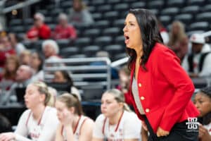 Nebraska Cornhusker head coach Amy Williams calls out a play during a college basketball game against Indiana on Mar 4th, 2026, in Indianapolis, Indiana. Photo by Brandon Tiedemann